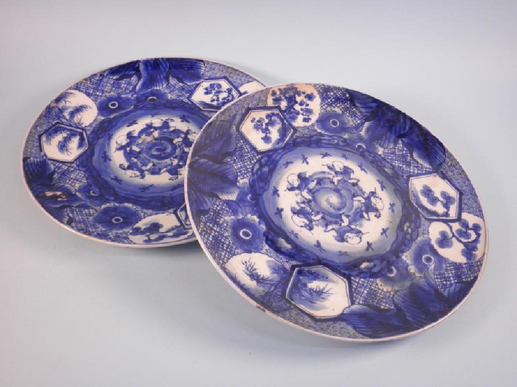 Appraisal: A pair of Japanese blue and white chargers porcelain chargers