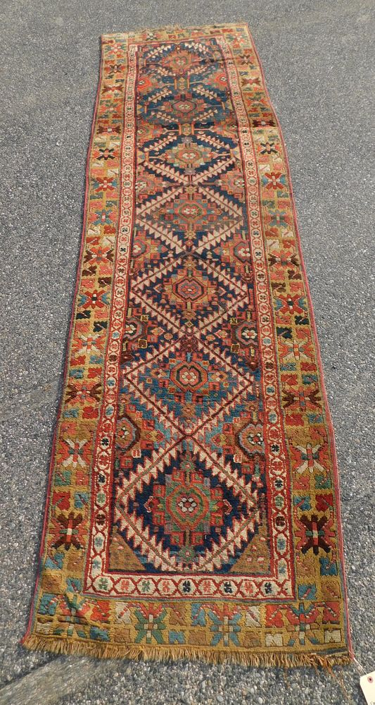 Appraisal: ANTIQUE PERSIAN RUNNER CARPET Antique Northwest Persian hall runner ft