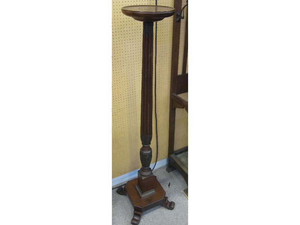 Appraisal: Mahogany torchere with reeded stem