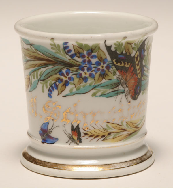 Appraisal: Occupational shaving mug butterflies Gilt trim Limoges Burning Cincinnati Good