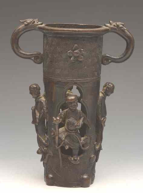 Appraisal: A CHINESE CYLINDRICAL BRONZE INCENSE BURNER with two handles having