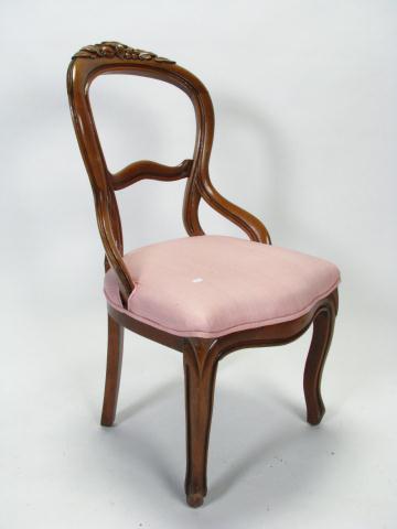 Appraisal: A Victorian Side Chair with leaf and nut carvings and