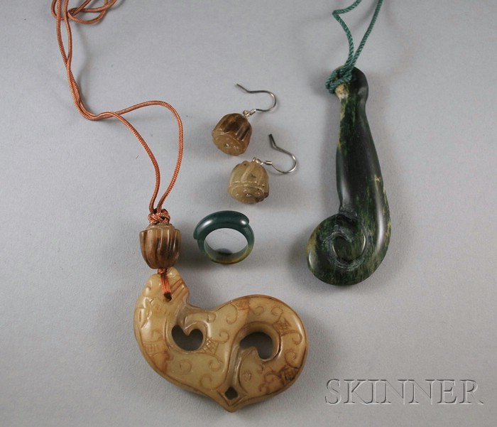 Appraisal: Small Group of Carved Green Hardstone Jewelry a carved jade