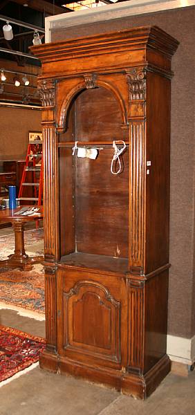 Appraisal: A Baroque style walnut bookcase cabinet part th century height