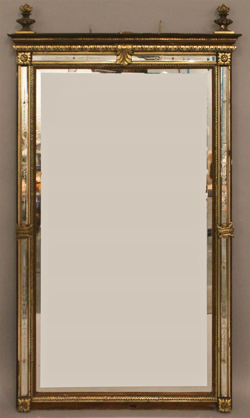 Appraisal: LARGE CLASSICAL STYLE GILT WALL BEVELED AND FRAMED MIRROR having