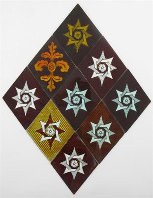 Appraisal: A collection of Victorian diamond shaped stained glass panels variously