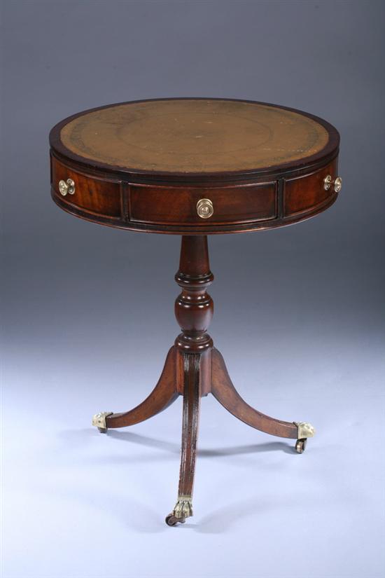 Appraisal: REGENCY MAHOGANY LEATHER-TOP REVOLVING DRUM TABLE th century with later