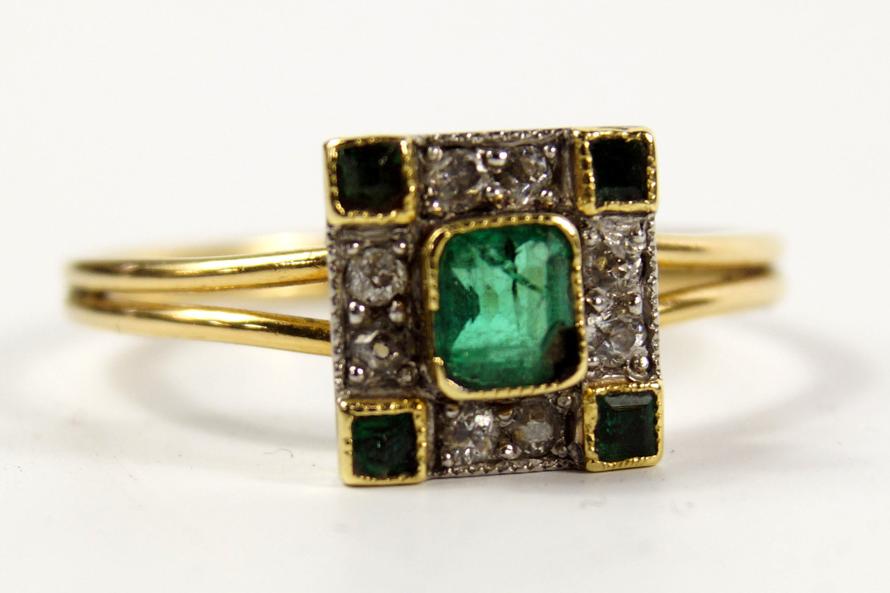 Appraisal: An Art Deco emerald and diamond ring in a yellow