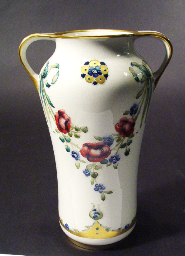 Appraisal: Moorcroft McIntyre two handled Florian ware vase painted and tubelined