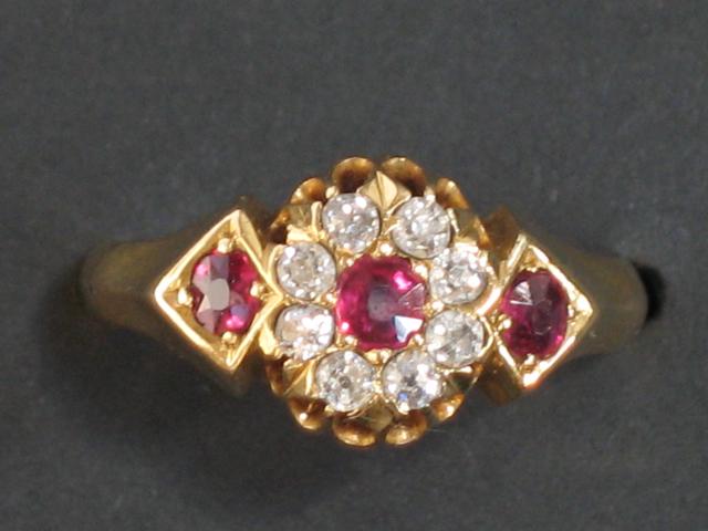 Appraisal: A VICTORIAN RUBY AND DIAMOND DRESS RING the central cushion-cut