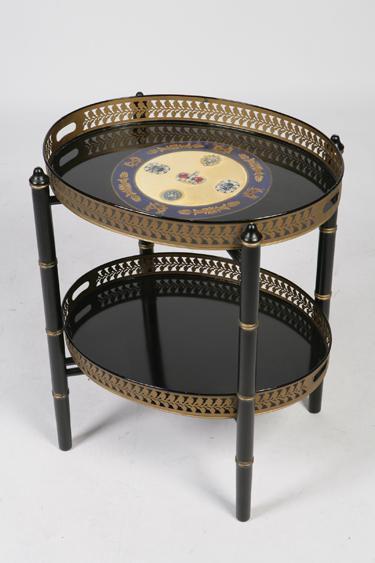 Appraisal: A REGENCY STYLE TOLE PEINTE TWO TIER TRAY TABLE the