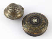 Appraisal: A turned horn circular box with brass pique and a