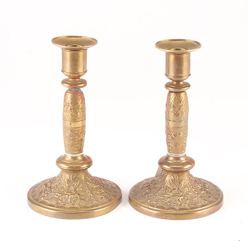 Appraisal: Pair of Tiffany Co brass-washed embossed candlesticks Stamped mark