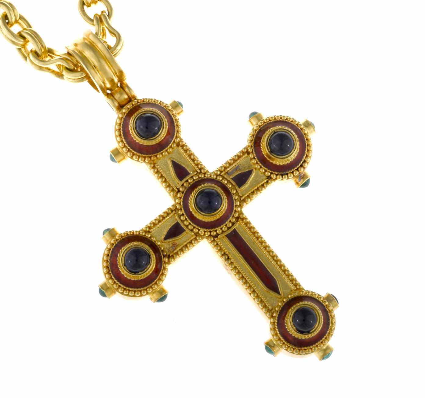 Appraisal: A sapphire emerald enamel and twenty-two karat gold cruciform pendant