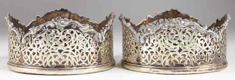 Appraisal: Pair of George III Sheffield Plate Wine Coastershaving reticulated sides