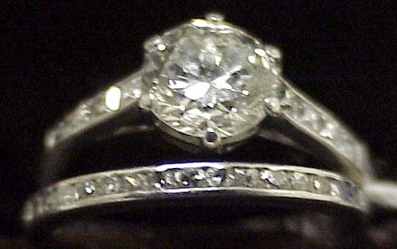 Appraisal: JEWELRY Lady's platinum diamond engagement ring and wedding band set