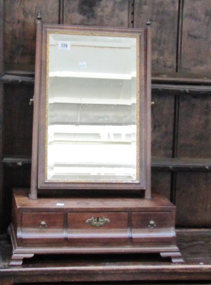 Appraisal: A mid th century parcel gilt mahogany toilet mirror with