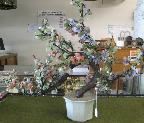 Appraisal: A CHINESE JADE TREE the celadon planter holding Peking glass