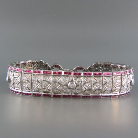 Appraisal: Ruby Diamond Bracelet round diamonds totaling carats and rectangular French