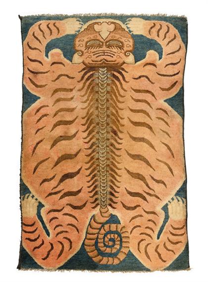 Appraisal: Fine Tibetan 'tiger' rug th century Of rectangular form woven