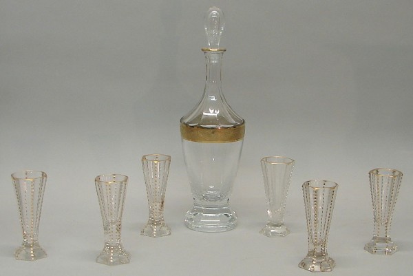 Appraisal: Set of seven pieces One tall decanter with gilt band