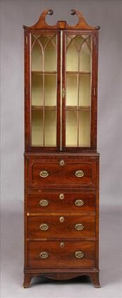 Appraisal: GEORGE III DIMINUTIVE MAHOGANY BOOKCASE CABINET The swan's neck cresting