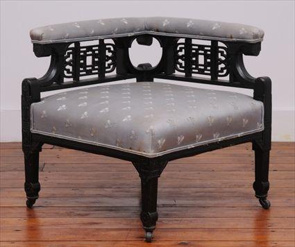 Appraisal: AMERICAN AESTHETIC MOVEMENT CARVED INCISED AND EBONIZED CORNER CHAIR The