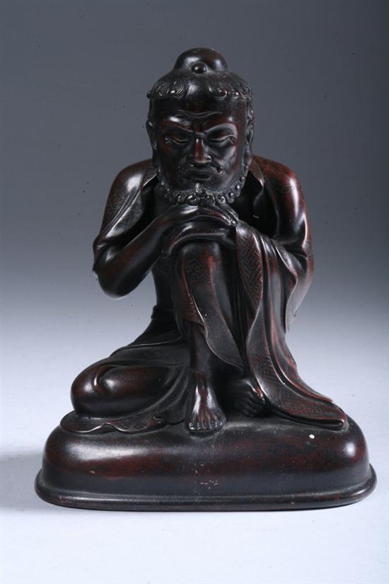 Appraisal: CHINESE BRONZE FIGURE OF LOHAN Qing Dynasty Seated at ease