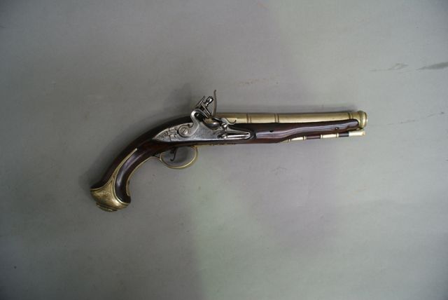 Appraisal: An English flintlock Officer's pistol caliber inch barrel the bronze