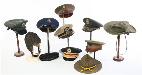 Appraisal: COLLECTION OF TH-CENTURY MILITARY HATS American Eleven hats from WW