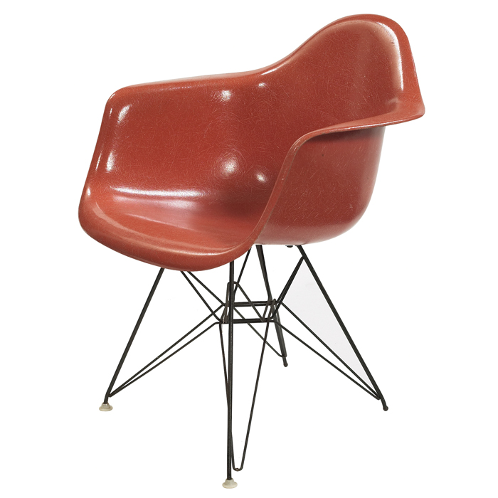 Appraisal: Charles Ray Eames shell chair by Herman Miller red-orange shell