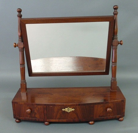 Appraisal: Sheraton mahogany bow-front shaving stand c with three drawers h