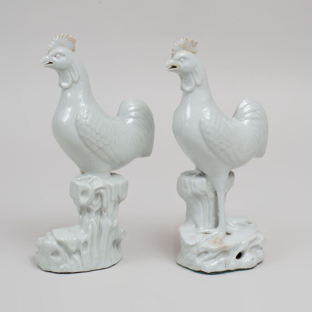 Appraisal: Pair of Chinese White Glazed Pottery Figures of Roosters on