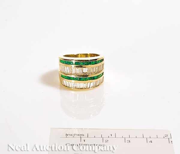 Appraisal: A kt Yellow Gold Emerald and Diamond Ring quadruple band