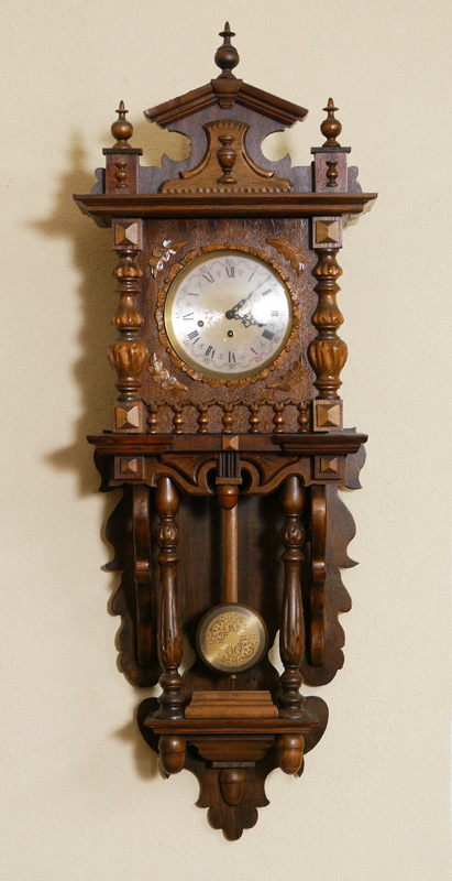 Appraisal: EUROPEAN CARVED WALNUT WALL CLOCK Removable pediment over walnut case