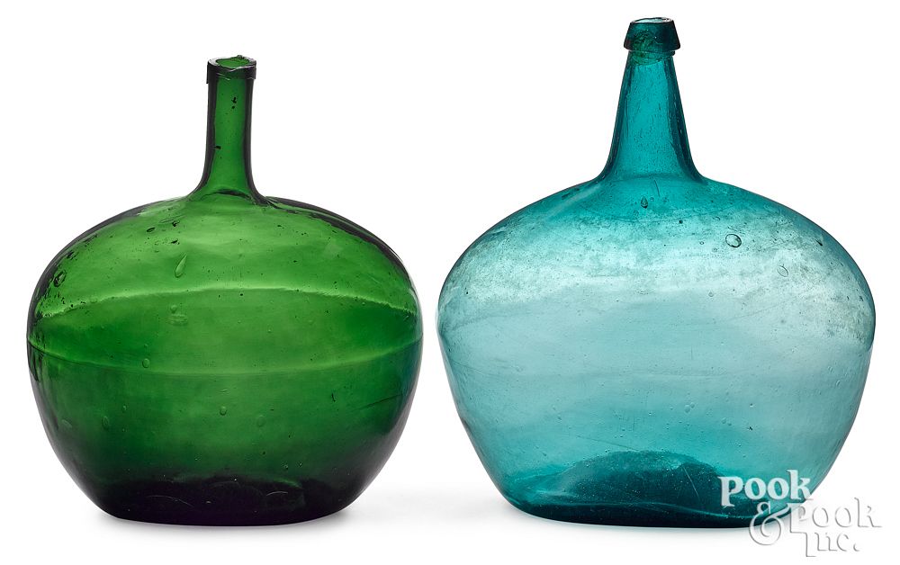 Appraisal: Two glass demijohns to include aqua and olive gre Two