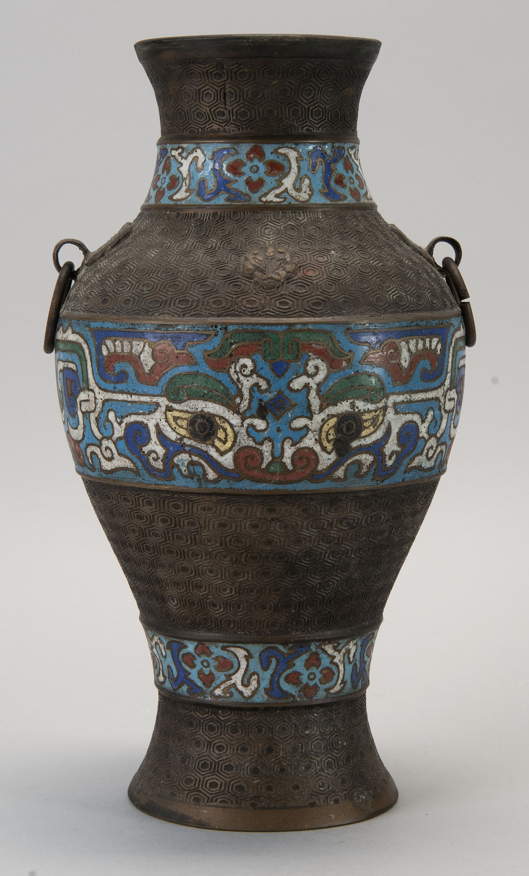 Appraisal: CHAMPLEV ENAMEL-ON-BRONZE VASE Taisho Period In baluster form with mask