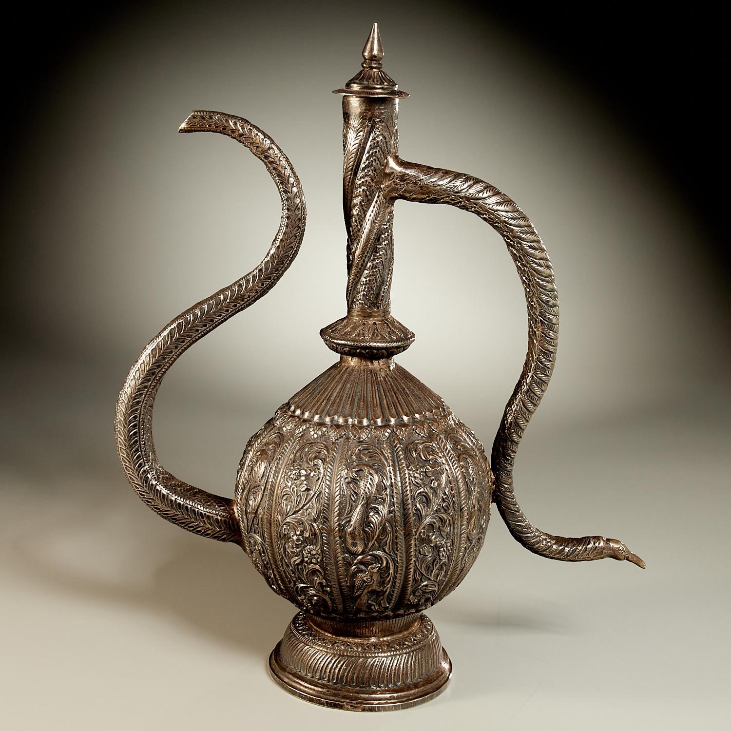 Appraisal: PERSIAN SILVER DAMASCENED EWER th th c tested silver purity