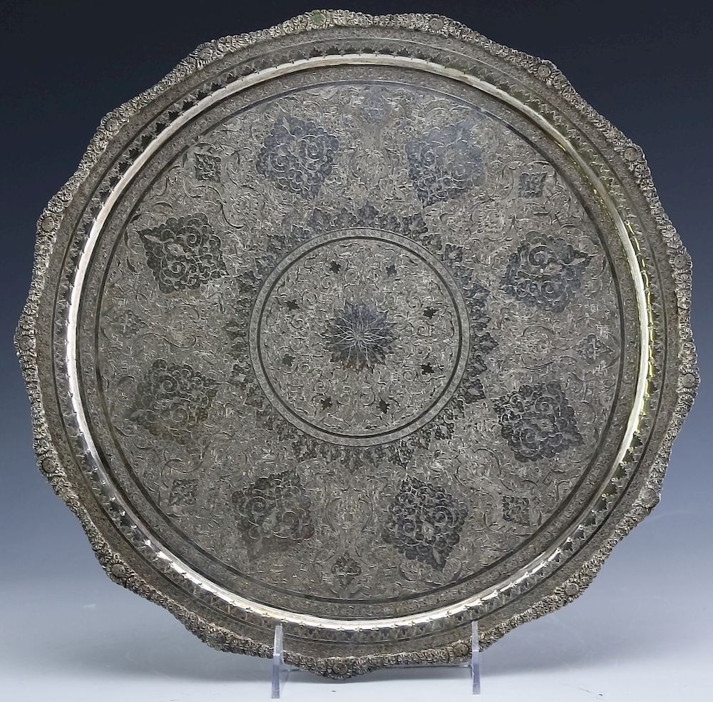 Appraisal: Persian Silver Ornate Engraved Platter Tray Crafted of grade silver