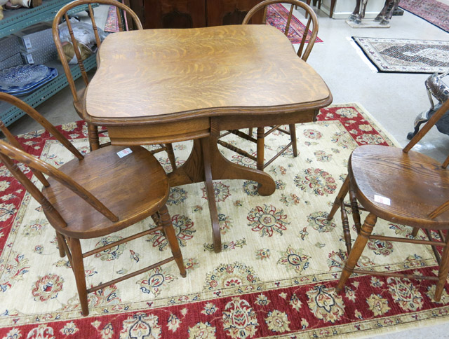 Appraisal: AN ANTIQUE OAK CARD TABLE AND CHAIR SET American c