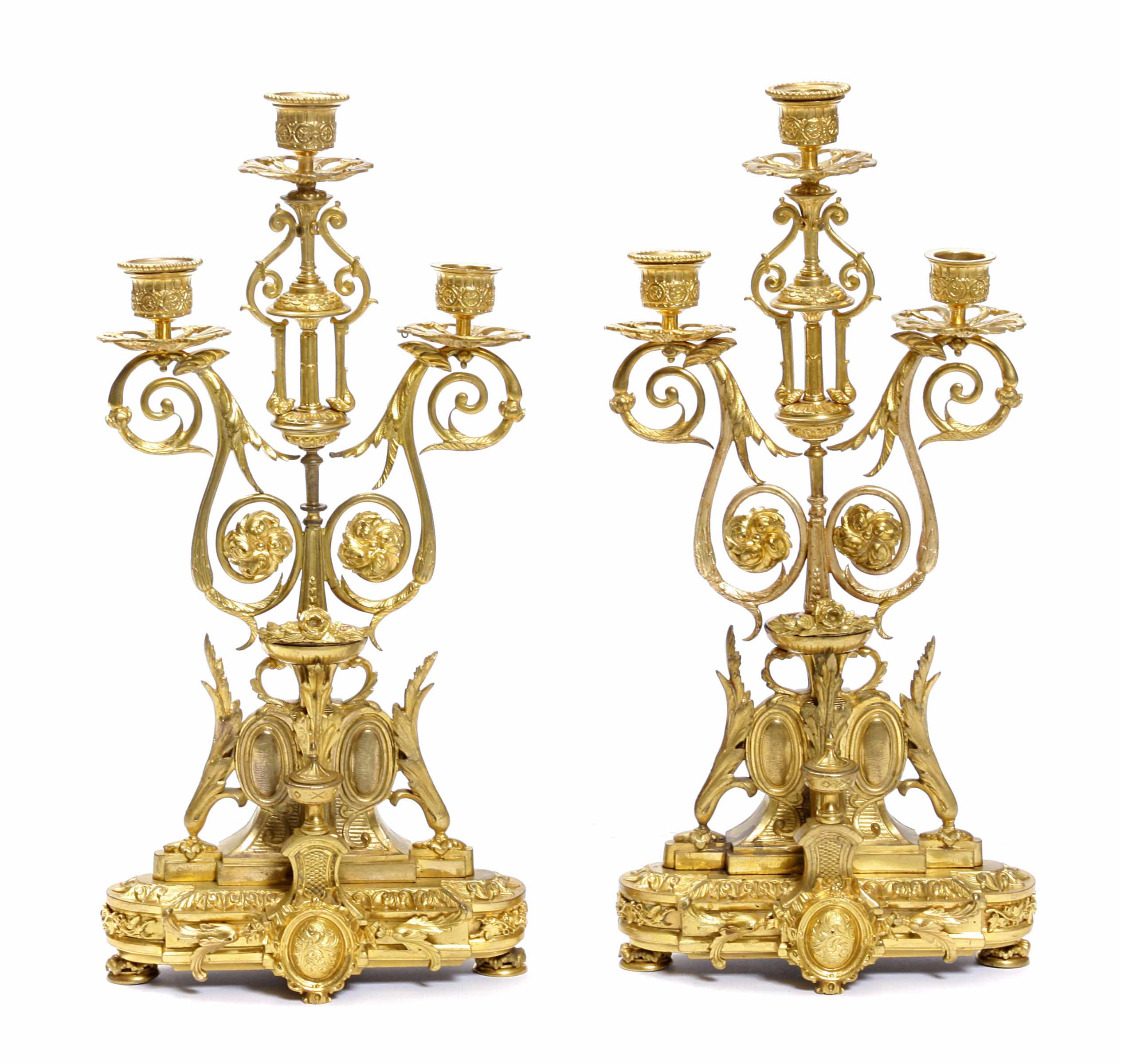 Appraisal: A pair of Louis XVI style gilt bronze three light