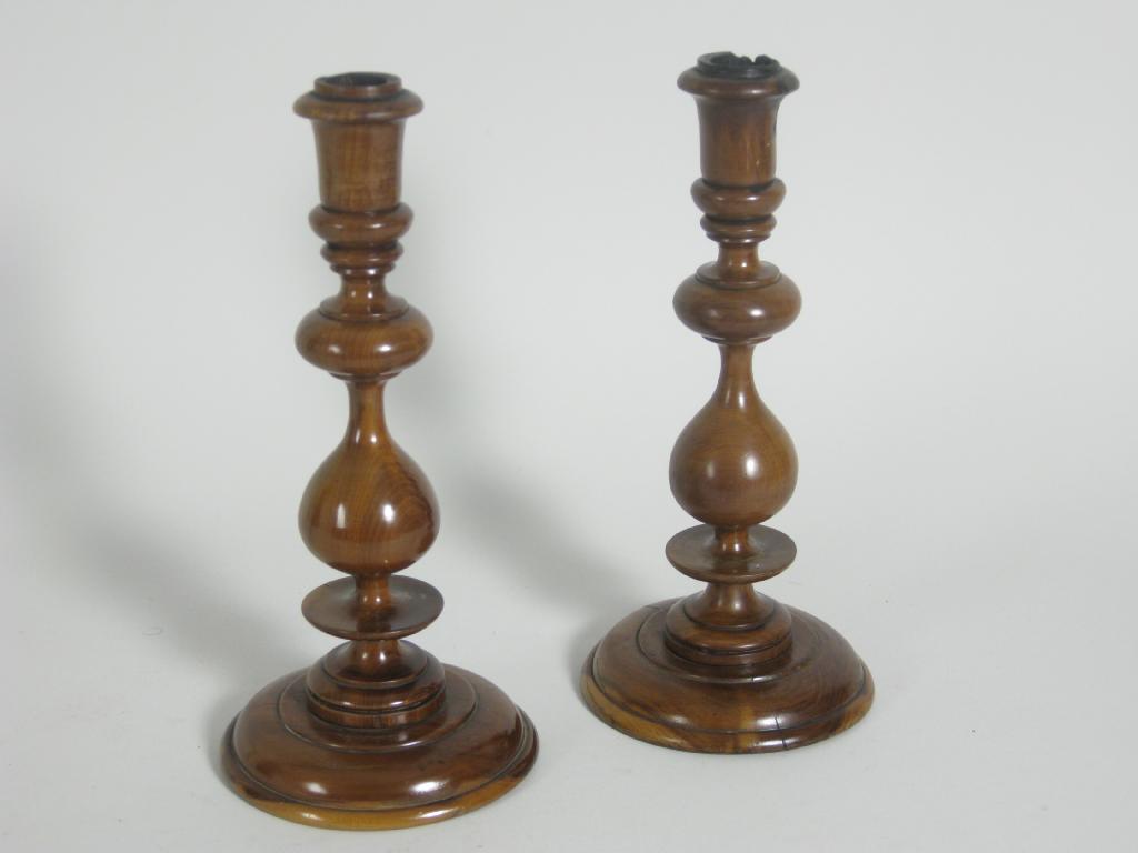 Appraisal: Pair of th Century walnut Candlesticks of bulbous baluster from