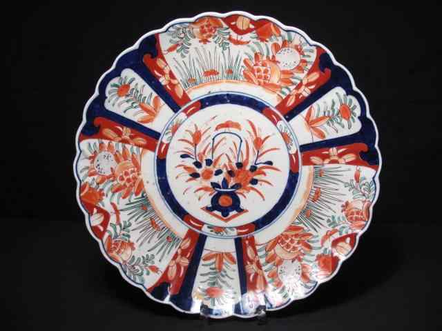 Appraisal: Large Imari style charger Colors of iron red cobalt blue