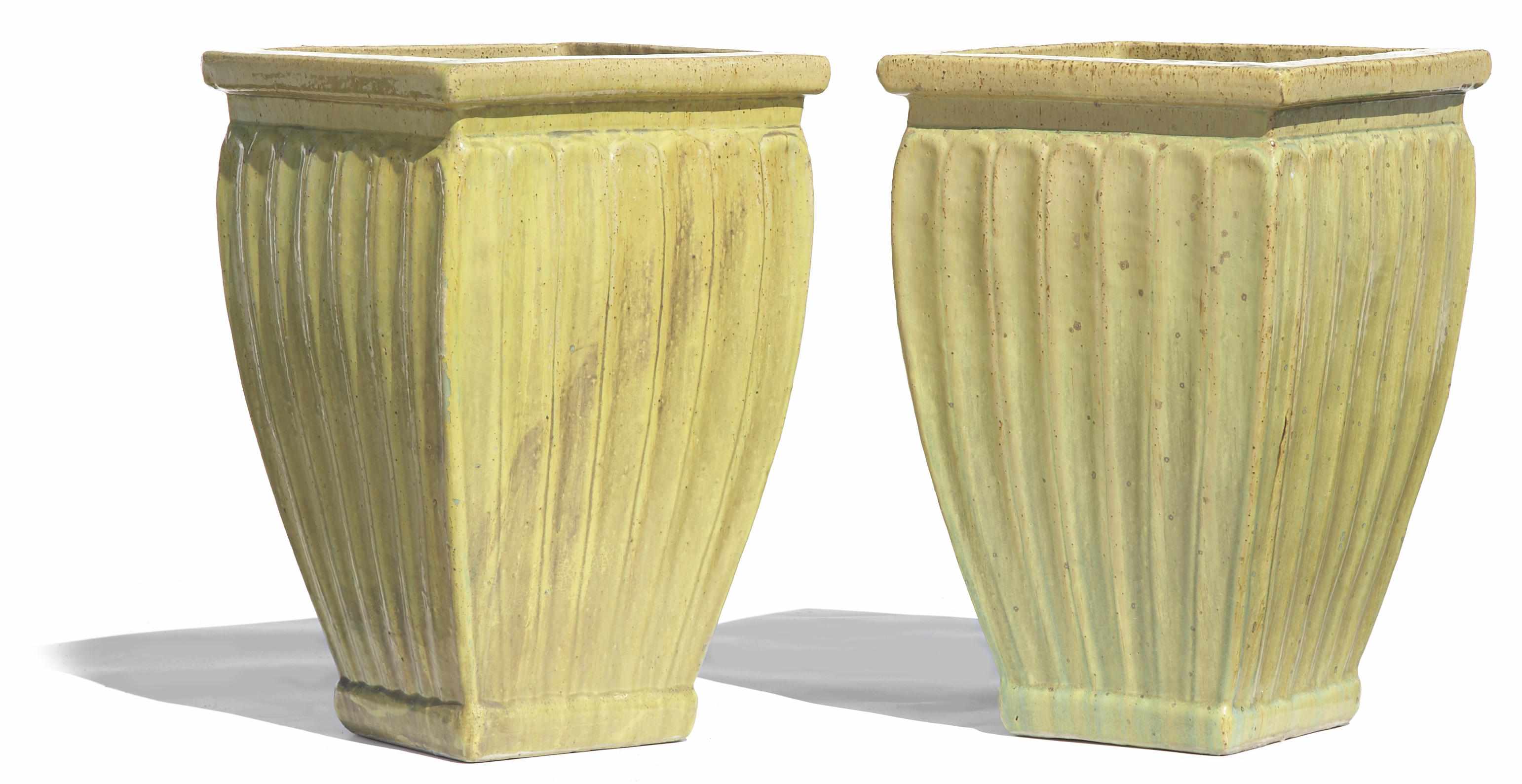 Appraisal: Two glazed earthenware jardinires of square fluted formheight in width