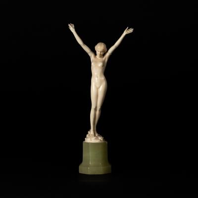 Appraisal: Ferdinand Preiss - Youth a carved ivory nude her arms