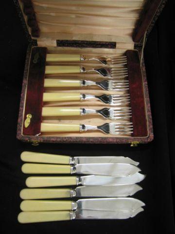 Appraisal: pc Silverplate Fish Set forks knives with celluloid handles in