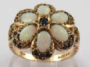 Appraisal: A carat gold opal and sapphire ring head approx cm