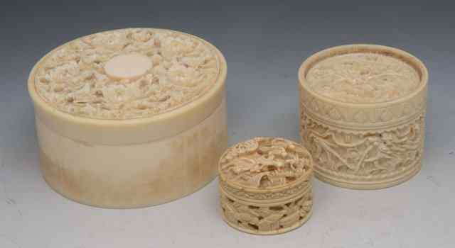 Appraisal: A CHINESE CANTON CARVED IVORY CIRCULAR BOX and cover a