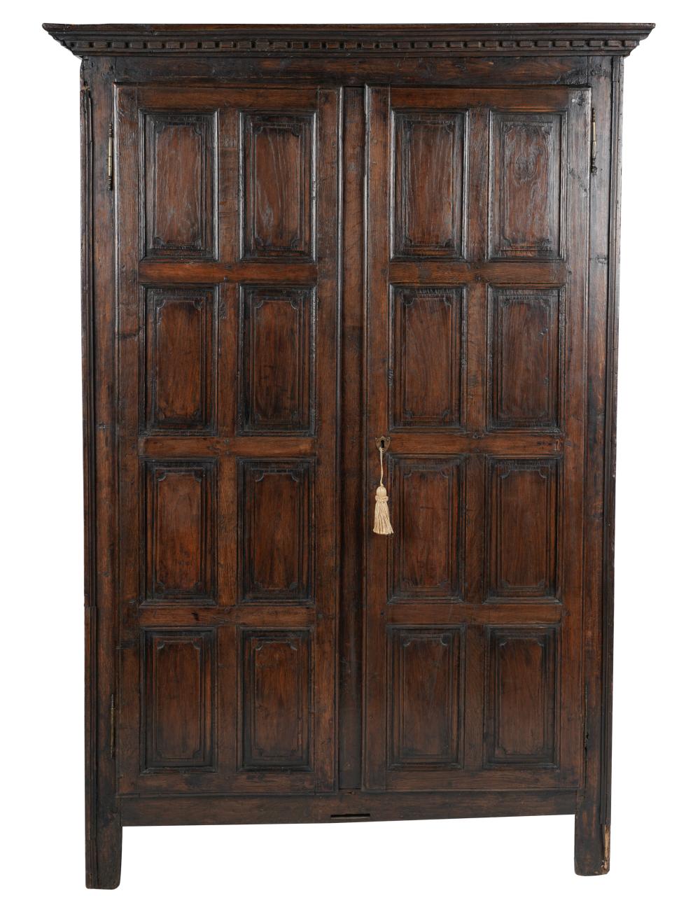 Appraisal: CONTINENTAL WALNUT ARMOIREthe pair of paneled doors opening to two