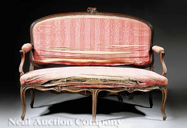 Appraisal: A Louis XVI Carved Mahogany Settee late th c the